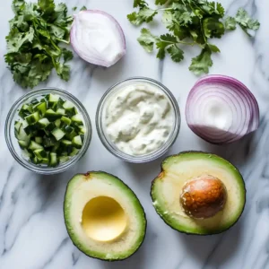 Fresh avocado being sliced for chicken avocado ranch burritos