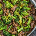 The Best Beef and Broccoli Recipe in One Pan 11 Close-up of beef and broccoli stir-fry in a stainless steel skillet
