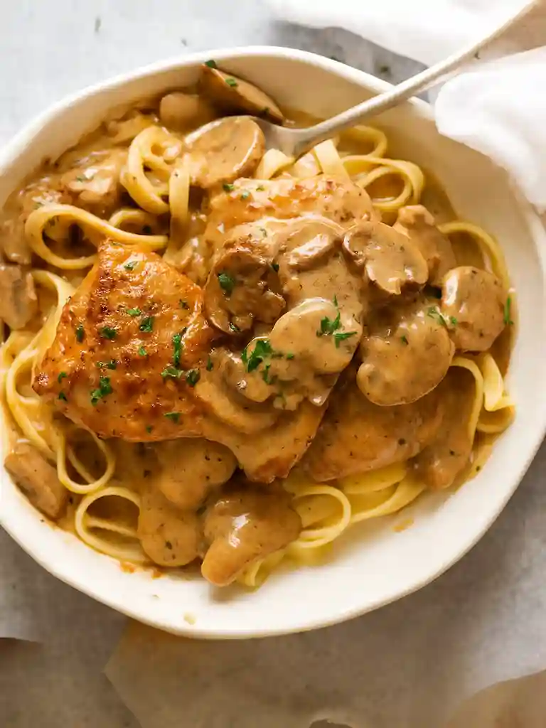 Chicken Stroganoff Recipe (Easy, Creamy, Comfort Food Classic) 3 Chicken Stroganoff with mushrooms and creamy sauce over pasta