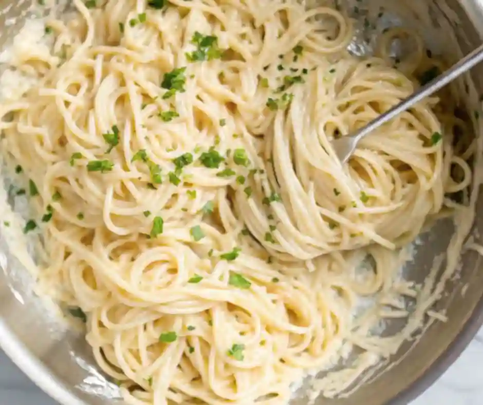 One-Pot Garlic Parmesan Pasta Recipe 6 finished garlic parmesan pasta in skillet with creamy sauce and herbs