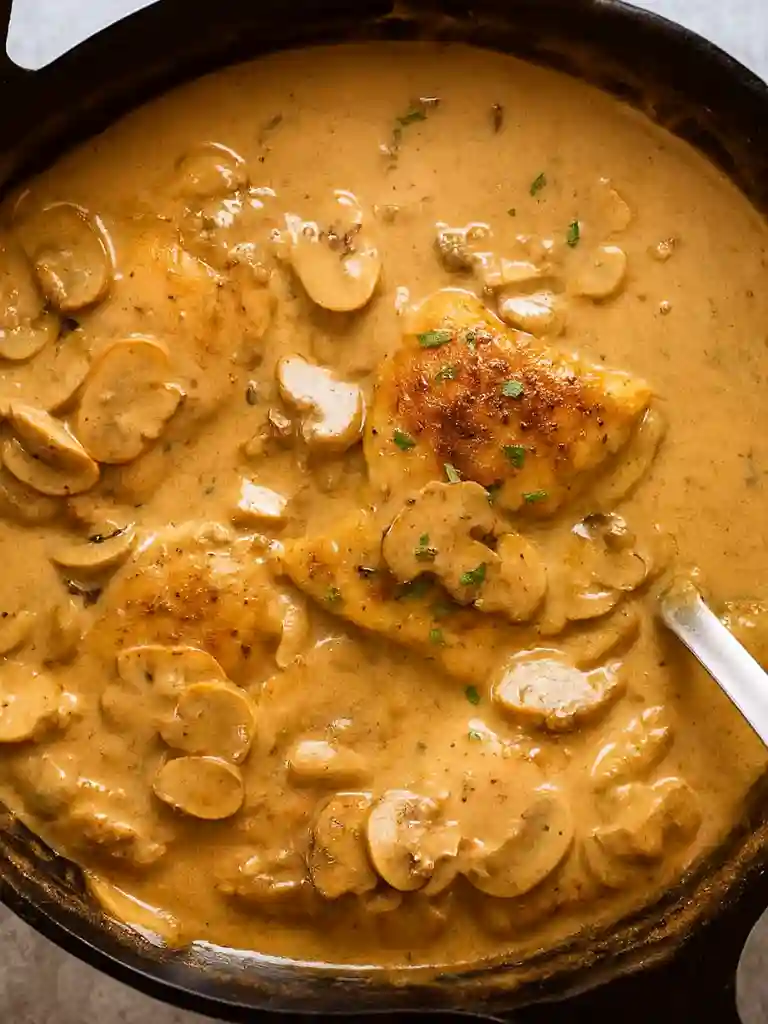 Chicken Stroganoff Recipe (Easy, Creamy, Comfort Food Classic) 4 Chicken Stroganoff in a skillet with mushrooms and creamy sauce