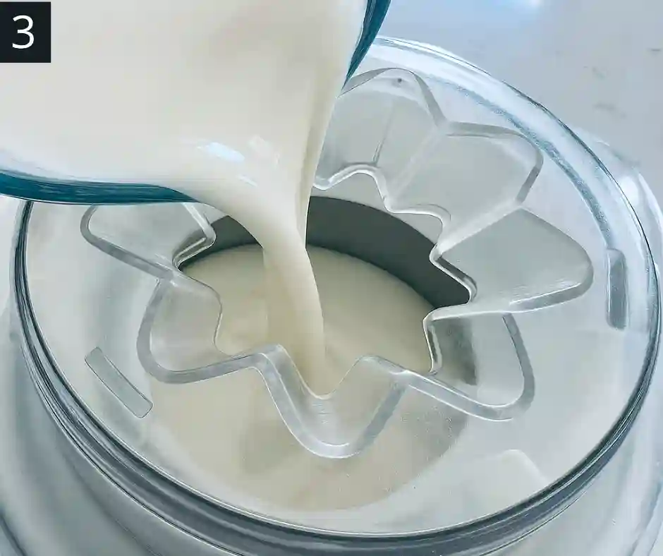 Cookies and Cream Ice Cream Recipe 4 Ice cream base being poured into churner for Cookies and Cream Ice Cream