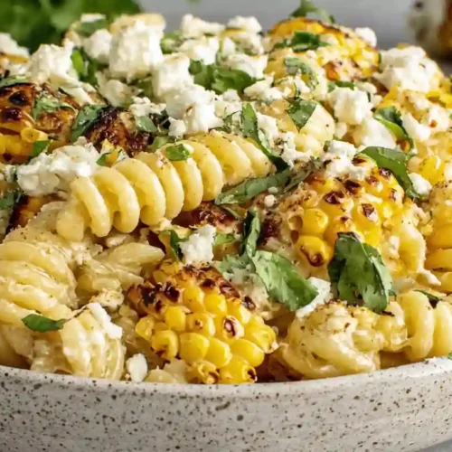 Healthy Street Corn Pasta Salad Recipe 4 Close-up of creamy Street Corn Pasta Salad with grilled corn and fresh cilantro